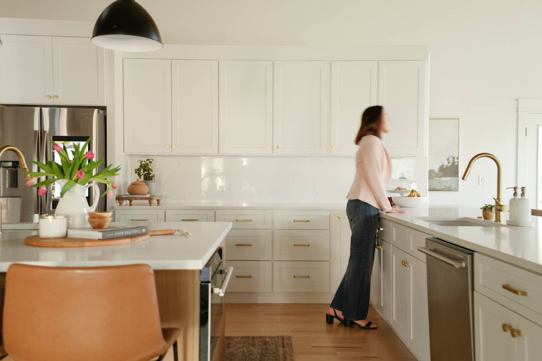 Hands reviewing curated home finish and design samples